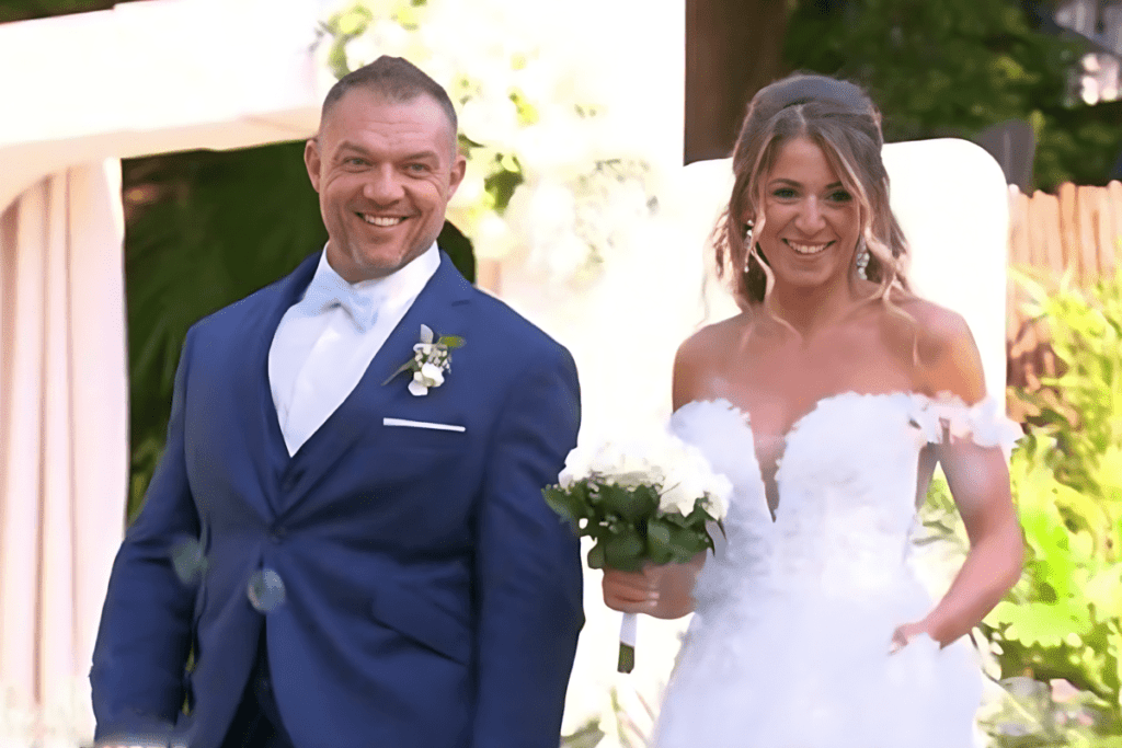 Photo de Jessica et pascal en robe blance au mariage 2023